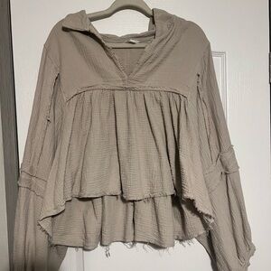 Cream long sleeved blouse